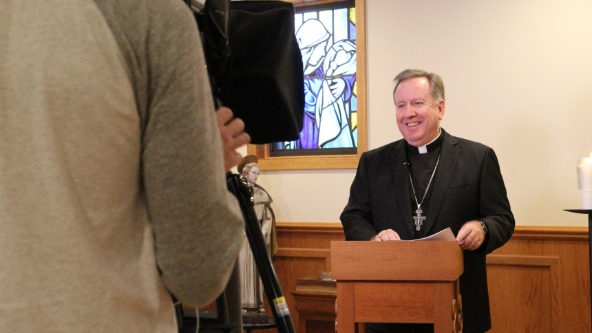 Bishop McClory with cameras