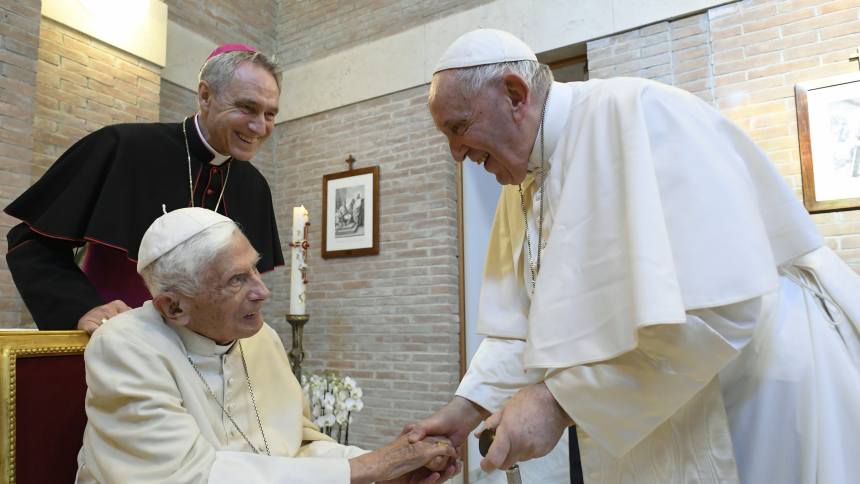 Pope Francis greets Pope Benedict