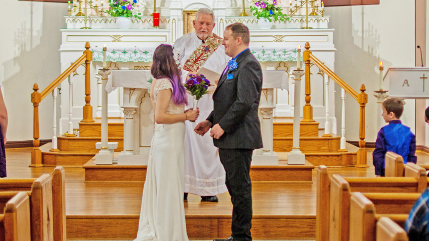 Deacon Michael East witnesses the exchange of wedding vows of Blake Davidson, right, a grandson of Deacon East, and Lacy Joslin Oct. 26, 2019, at St. Ambrose Church in Seymour, Ind. (OSV News photo/courtesy family)