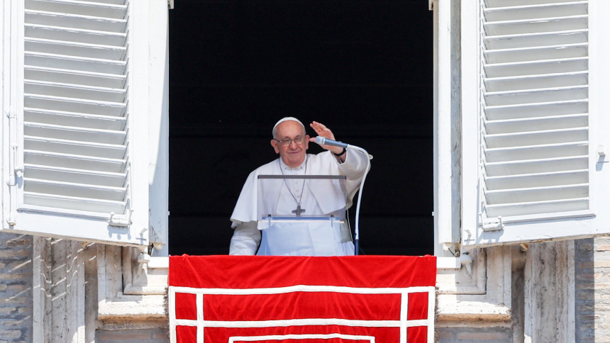 Pope Francis greets visitors gathered in St. Peter's Square at the Vatican to pray the Angelus Aug. 15, 2023. (CNS photo/Lola Gomez)