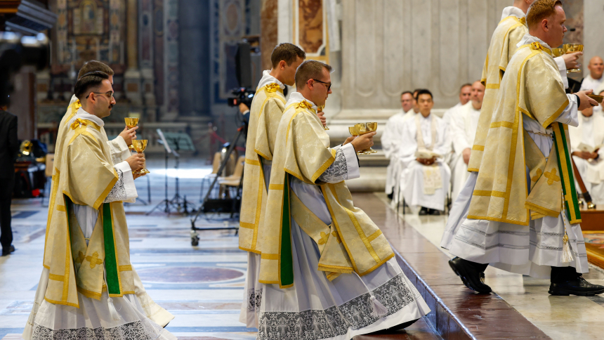 Newly ordained deacons from the Pontifical North American College carry offertory gifts during their ordination Mass in St. Peter's Basilica at the Vatican Sept. 28, 2023. (CNS photo/Lola Gomez)