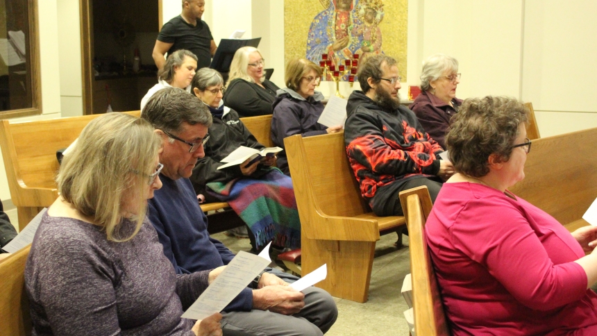 "Peace is Flowing Like a River" and "Christ Be Our Light" were hymns sung by attendees at the Prayer Service for Peace held at St. Matthias in Crown Point on Jan. 3. Education Committee members organized the event that drew about 20 people for hymns, prayers, scripture readings, a reflection by diaconal candidate Brad Hendrickson and Eucharistic Adoration. (Marlene A. Zloza photo)