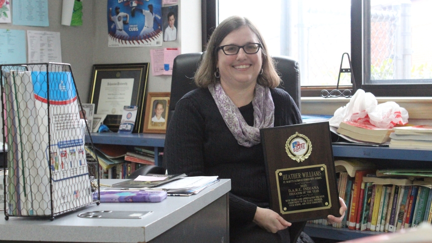 "Sometimes I just touch it to make sure it's still here," admitted Heather Williams of the plaque she received last fall as Indiana D.A.R.E. Teacher of the Year. "I'm still shocked," added the fifth-grade teacher at St. Mary Catholic Community School in Crown Point. (Marlene A. Zloza photo)