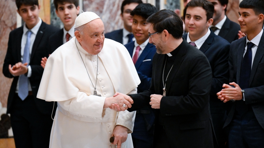 Pope Francis shakes hands with Cardinal José Cobo Cano of Madrid, Spain, during a meeting with a group of seminarians from the Archdiocese of Madrid at the Vatican Feb. 3, 2024. (CNS photo/Vatican Media)