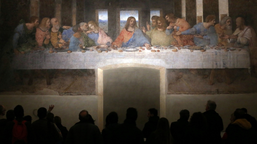 Visitors are pictured in a file photo looking at Leonardo da Vinci's "The Last Supper" on a refectory wall at Santa Maria delle Grazie Church in Milan. (OSV News photo/Stefano Rellandini, Reuters)  