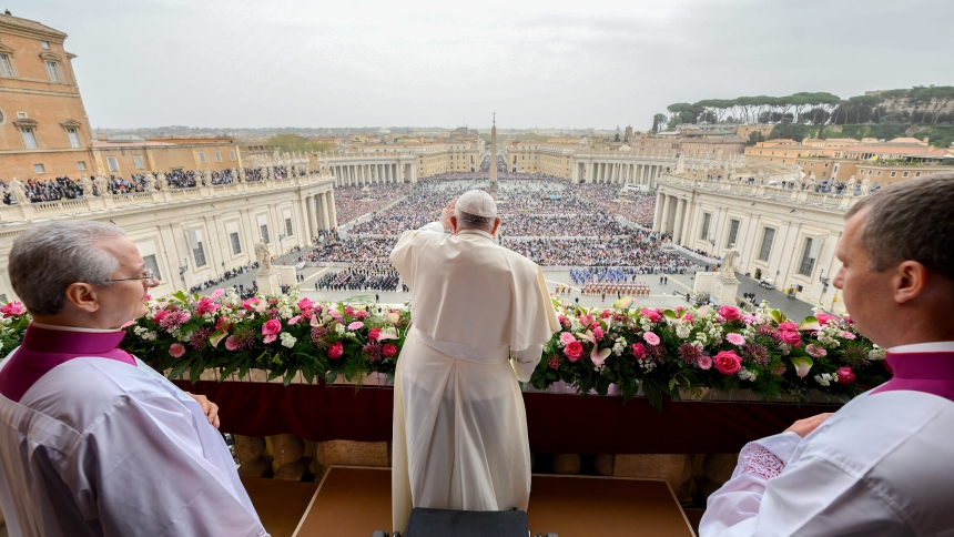 Pope Francis greets the crowd after delivering his Easter message and blessing "urbi et orbi" (to the city and the world) from the central balcony of St. Peter's Basilica at the Vatican March 31, 2024. (CNS photo/Vatican Media)