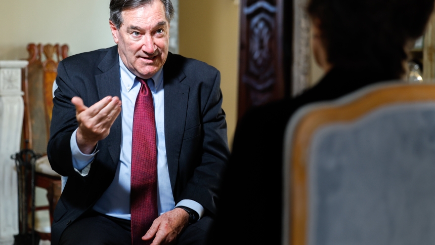 The U.S. ambassador to the Holy See, Joe Donnelly, speaks during an interview with Carol Glatz, senior correspondent for Catholic News Service, at his residence in Rome March 7, 2024. (CNS photo/Lola Gomez)